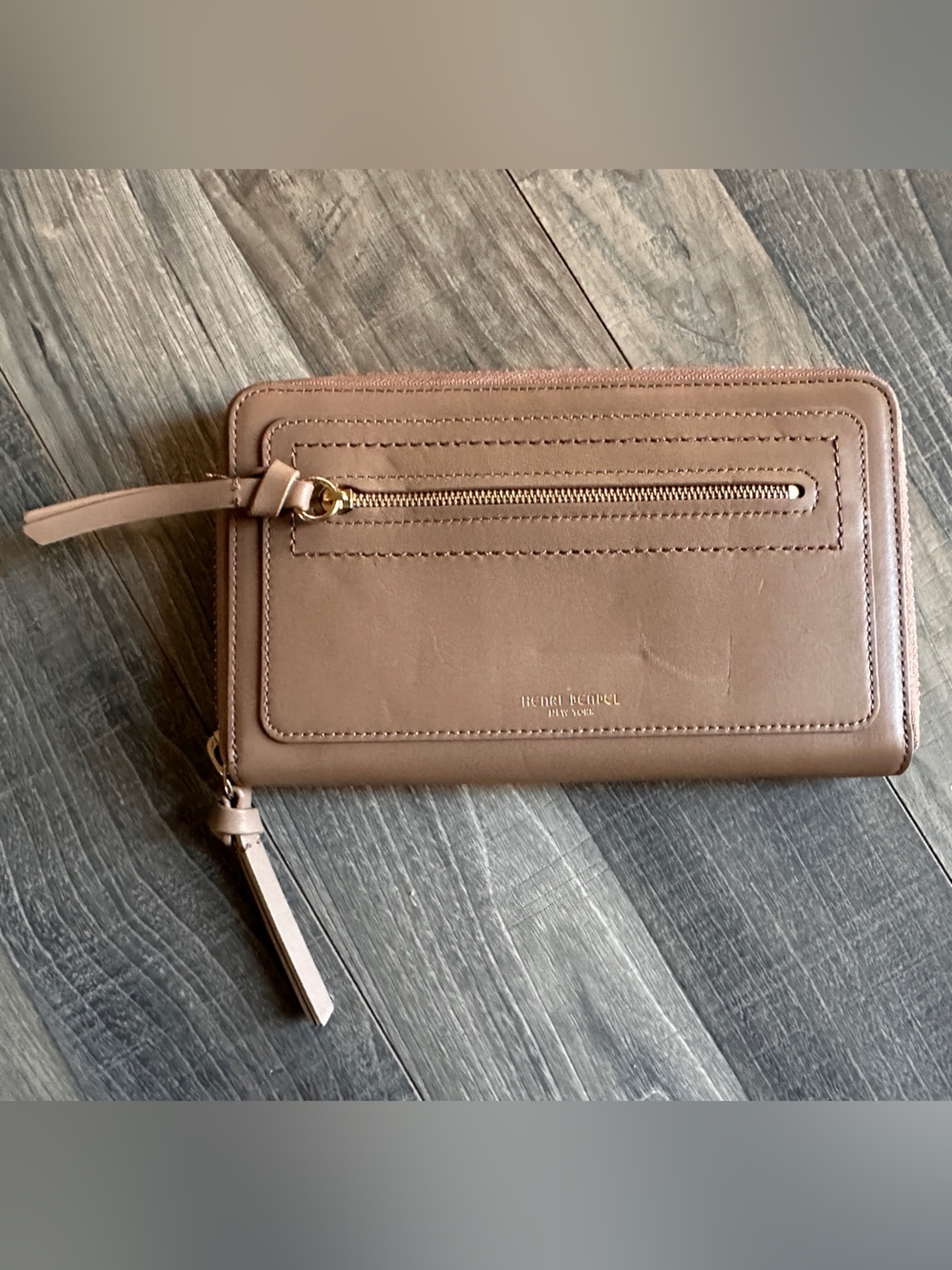 henri bendel taupe zip-around wallet with wrist strap